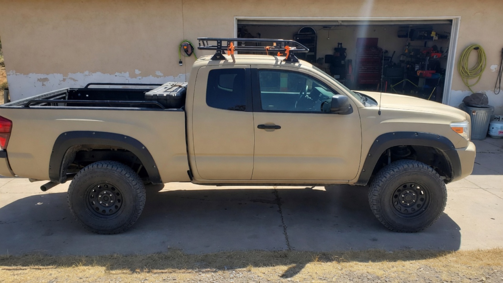 Tan lifted midsize truck reference